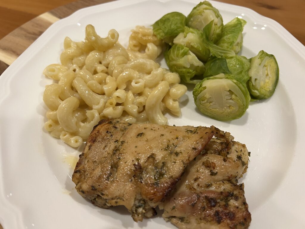 lemon garlic chicken thighs with macaroni and cheese and Brussel sprouts